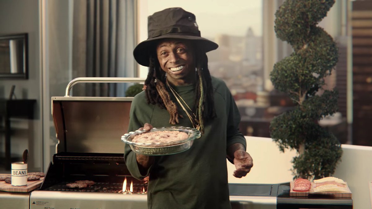 usweekly's tweet photo. George. And. Weezy. @LilTunechi @apartmentscom https://t.co/cQ6ynptsx8 #MovinOnUp #SB50 https://t.co/YAdP2C3zN5