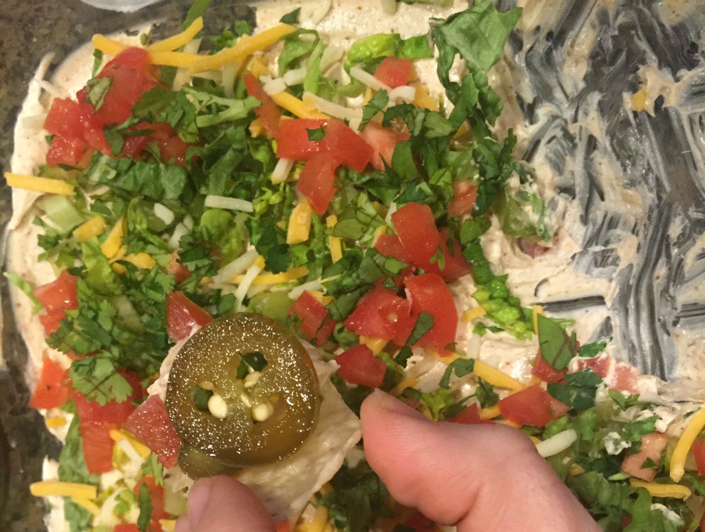 PuckerUpPickles's tweet photo. Enjoying some #SB50Eats - taco dip with jalapeños. What are you eating? https://t.co/pbD7xOozc0