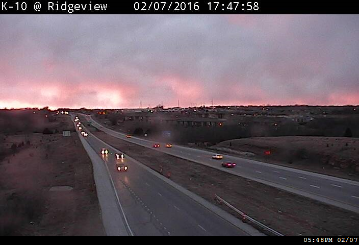 NWSKansasCity's tweet photo. Beautiful shots from @KansasCityScout webcams show virga glowing bright pink on KS side of the metro https://t.co/ijJPapazPC
