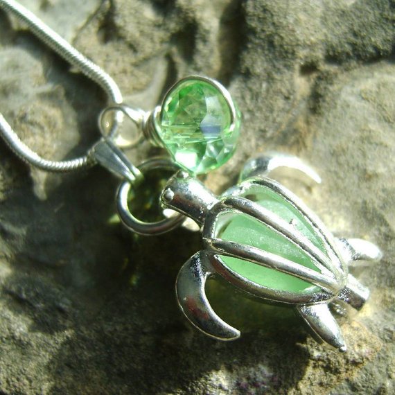 BeachtreasureD's tweet photo. Sea Glass Pendant: Seaglass Turtle Locket Necklace https://t.co/LvfuLJuqhf #Madebyhandbot #Birthday https://t.co/CVsk8M2lQU