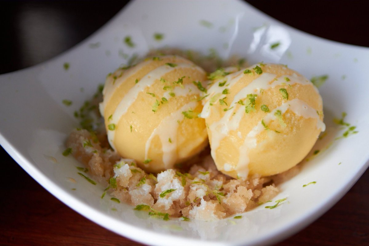 Zerozerosf's tweet image. Mango coconut sorbet with thai tea granita, haupia sauce and lime zest!