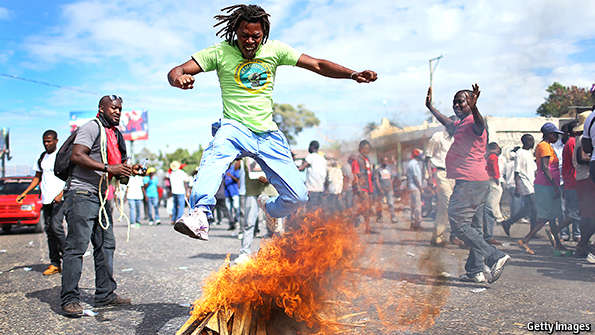 TheEconomist's tweet photo. Now without a president, Haiti is in limbo. A year ago its politics was just as messy https://t.co/vkB2JyZ9k7 https://t.co/EOaSqUkn0I