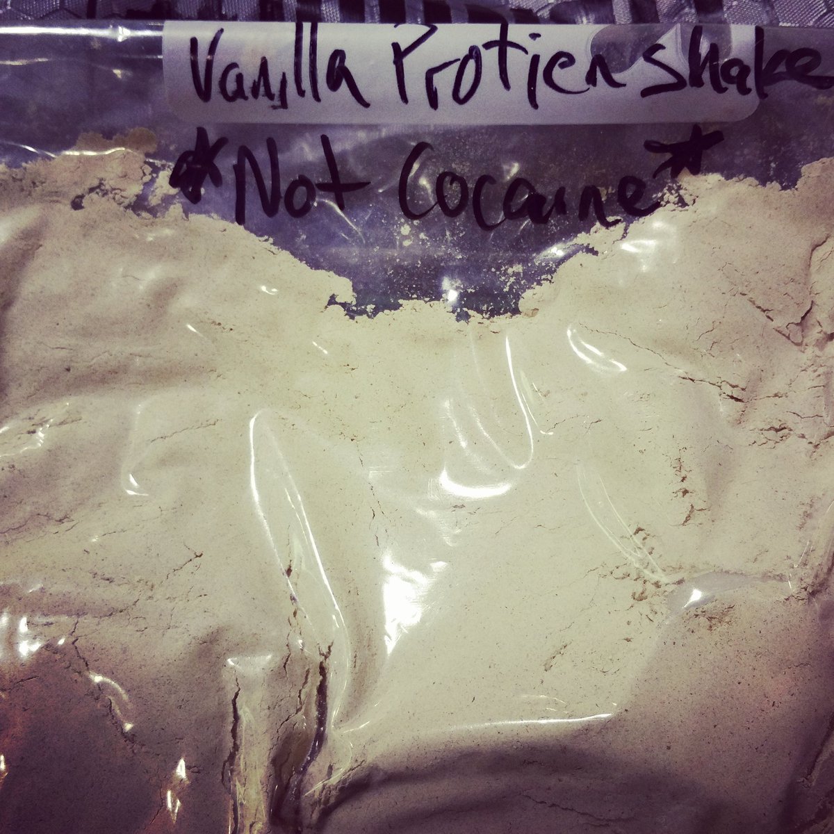 the_mike_flem's tweet photo. Didn't bring the protein powder marked *not cocaine* through TSA, spared the wife https://t.co/zjXqglPGom