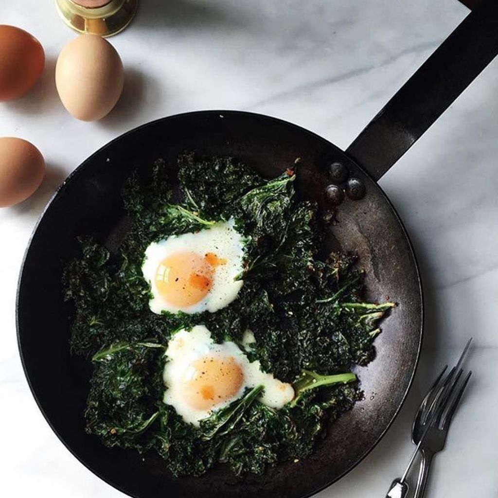 Cast_Iron_Cook's tweet image. Oven roasted greens with baked eggs + @tabasco sauce in @fortheloveofthesouth's kitchen. #meatlessmonday