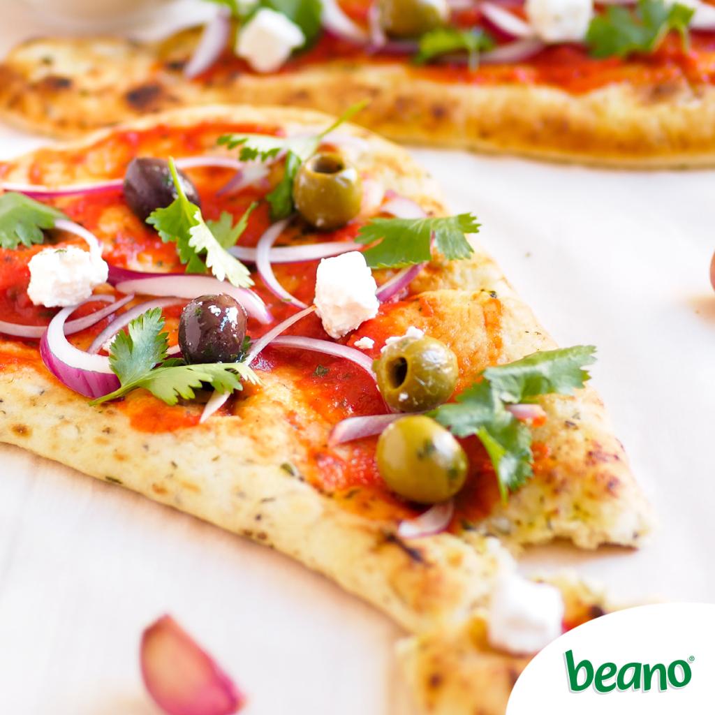 Happy #NationalPizzaDay! Opt for your favorite #veggies on toasted naan bread for a healthier homemade #pizza.