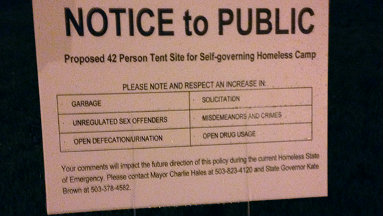 EmilySinovic's tweet image. park sign mocking #portland Mayor's plan allowing homeless camps on public property.  #liveonk2
