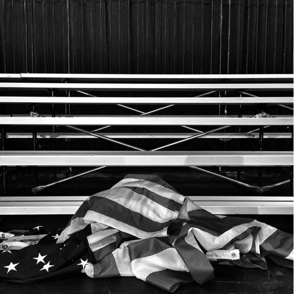 Hillary Clinton Election night party with American flag laying on floor