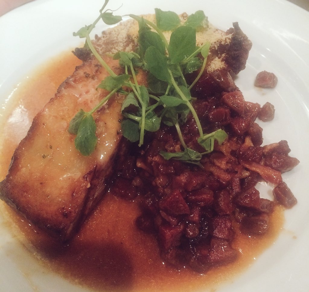 This evening's special: confit of pork belly served with potato fritter, sautéed chorizo and bacon, red wine jus!