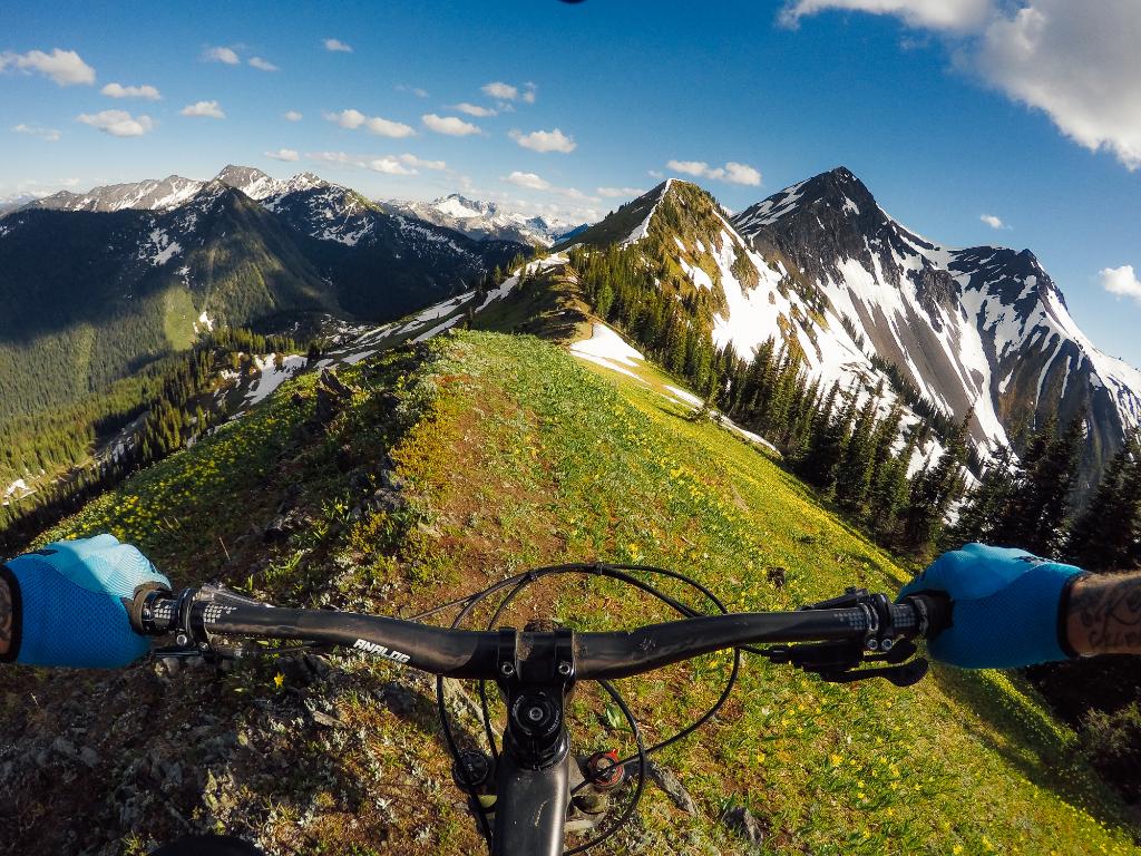 GoPro's tweet image. Photo of the Day! It's a fine line atop Rico Peak with @GeoffGulevich. #GoPro #MTB