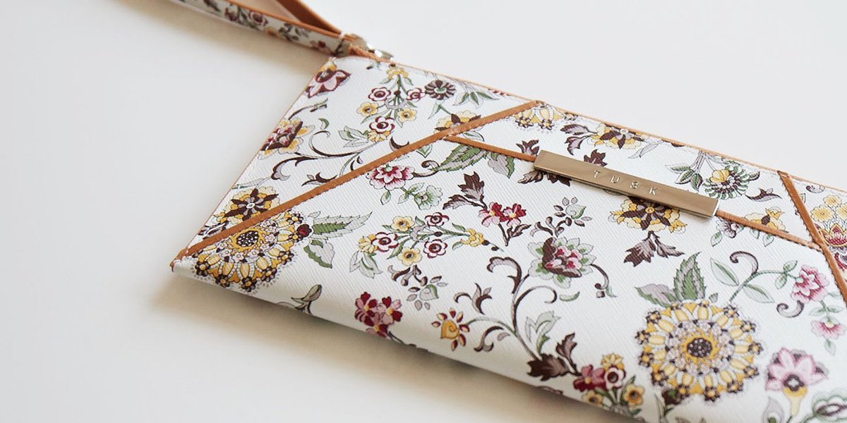 #throwback to a favorite SS15 collection: Provenza! Shop the floral print leather in our smartphone zip wallet style