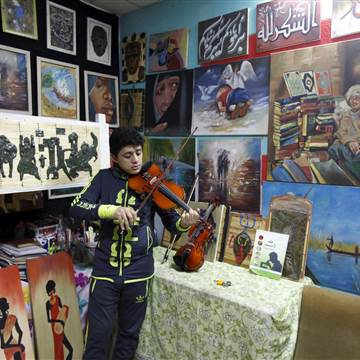 AMARLondon's tweet image. Meet the orphans who are using #art to cope with #Iraq's chaos: buff.ly/1QwjhGl #WithIraq #IraqCrisis