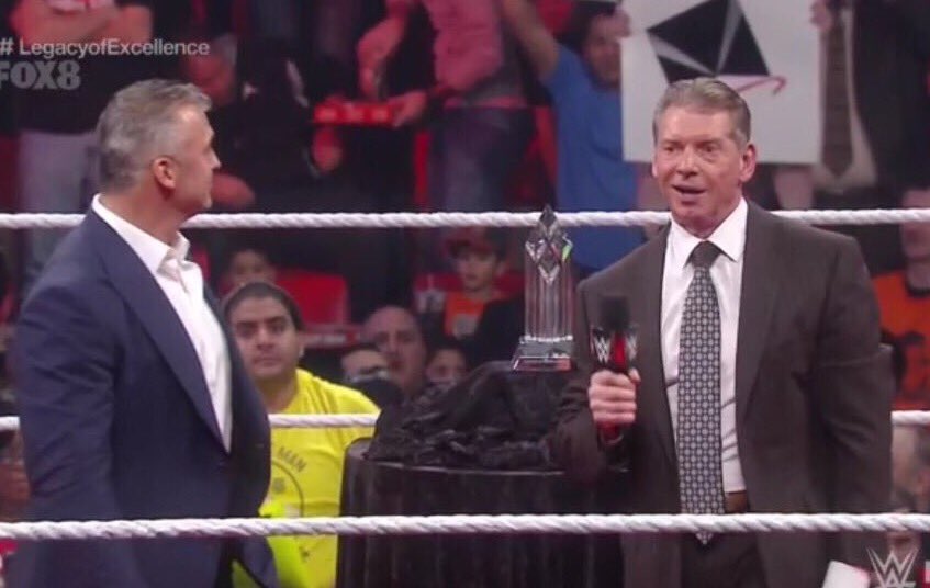 WhatCultureWWE's tweet photo. That moment when Shane McMahon spots a WhatCulture sign in the crowd during #Raw. https://t.co/B9bPmD4hlW