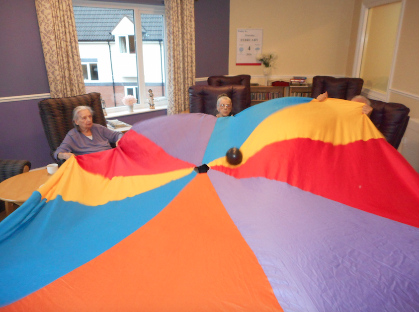 stgeorges_park's tweet photo. Residents, relatives and staff enjoying the parachute! #wecare #carehome #telford #exercise #health #activity #life https://t.co/a0l2humawc