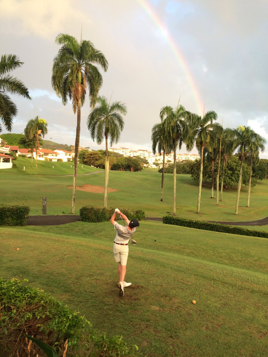 UNCGMGolf's tweet photo. Luke Haithcock teeing off in the final round of the #PRClassic under the rainbow. @PuertoRicoPUR #letsgoG https://t.co/KdGGOzZQnk