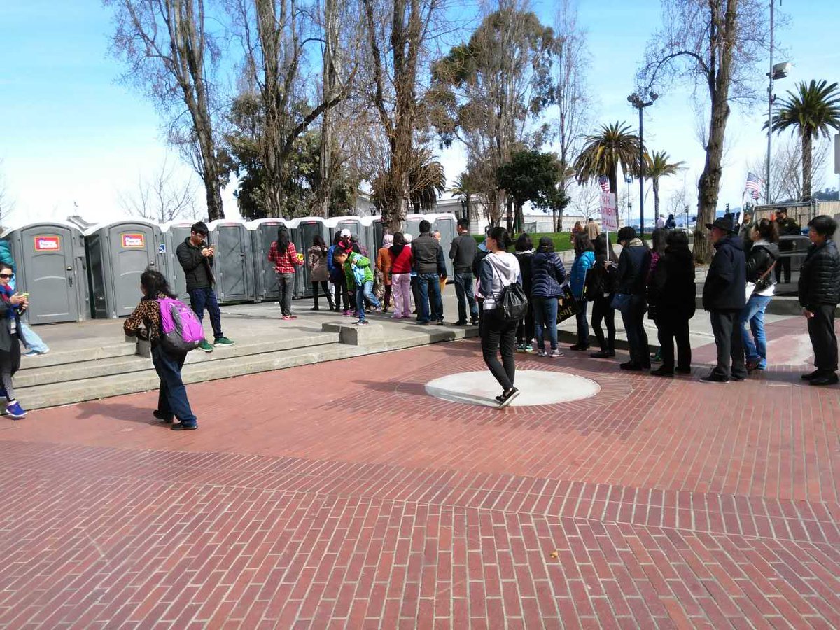 landian66's tweet photo. #Justice4Liang #rally220 15 portable bathrooms , still not enough for 10k people . long line,proud of you! https://t.co/9cdESgauMg