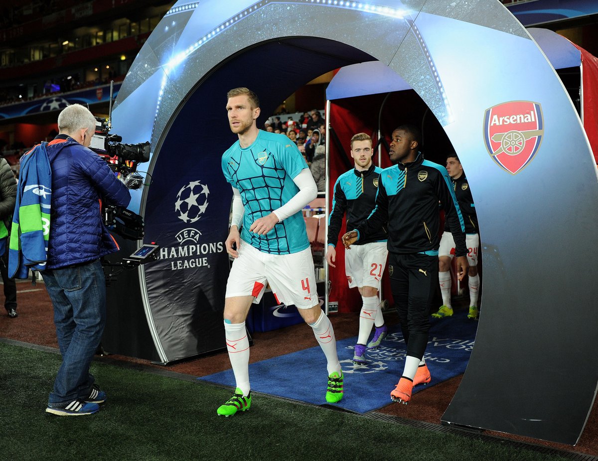Arsenal's tweet photo. Captain Per @Mertesacker leads @Arsenal out for their warm-up in front of a packed Emirates Stadium #AFCvFCB https://t.co/Kqltg6XoZo