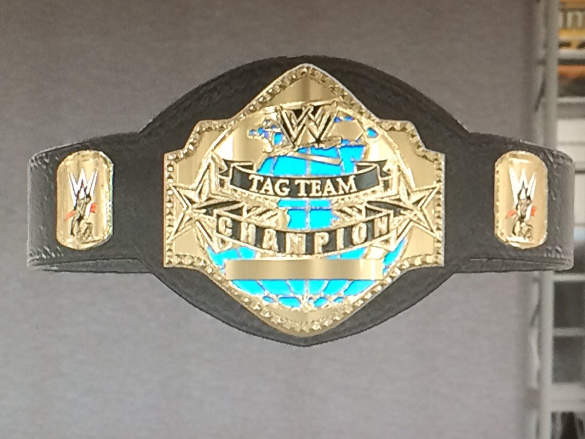 FreakOfNature_x's tweet photo. My custom tag championship! #WWE2K16 https://t.co/MV4mH8eKqm