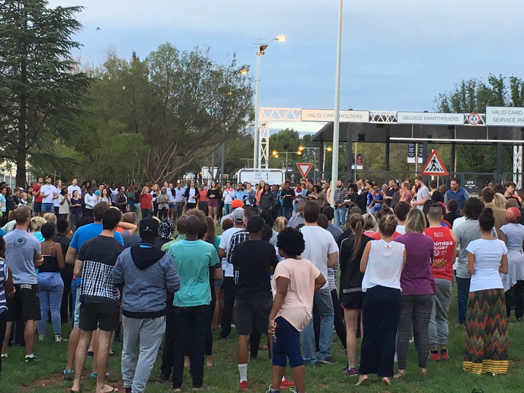 LoubserDIV's tweet photo. Students at the University of the Free State standing in unity against racism and violence #ColourBlind #UFSRevolt https://t.co/7Qr4yX4vAE