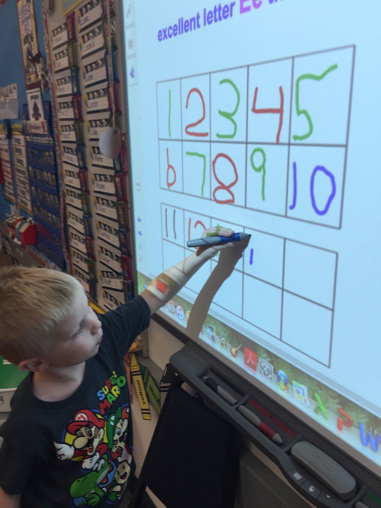 KBBigDogs's tweet photo. T. K. loves to use the Smart Board to practice writing our numbers. @rcsdstoneridge https://t.co/Ec75gZngdI