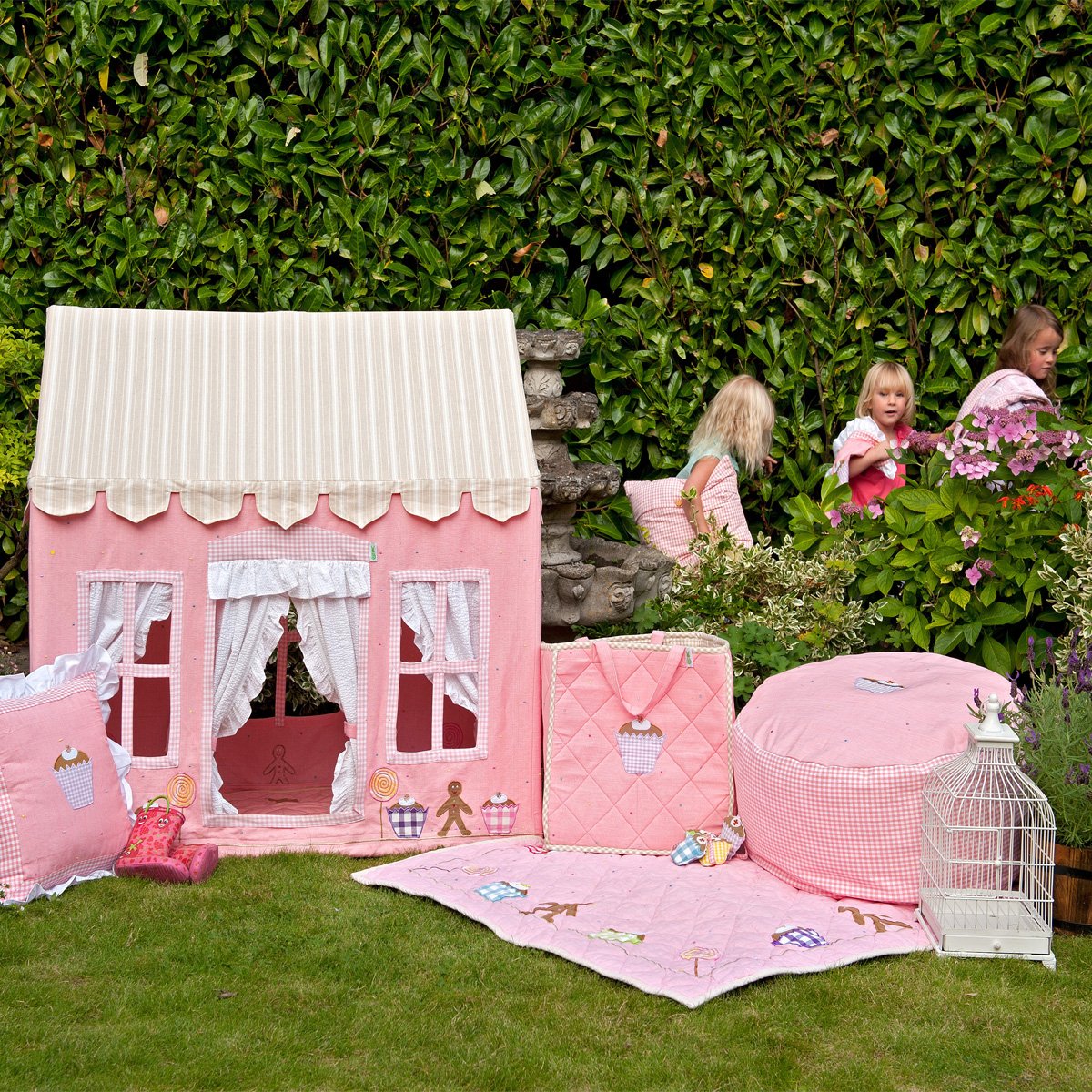 Our gorgeous, handmade playhouses are perfect to get your kids outside this spring!