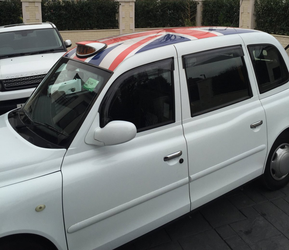Rylan's tweet photo. Me and my brother have just picked up our new cab. Trust me to go for this one... #SpiceUpYourLife X https://t.co/HByjcHGY7M