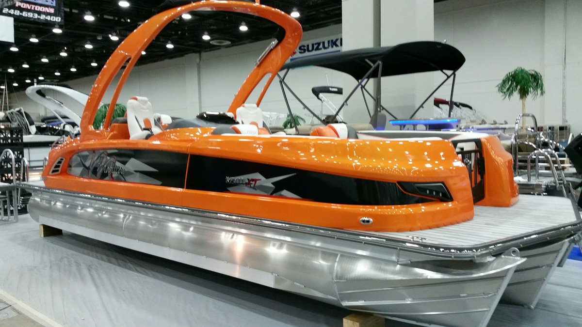 Unveiling the #Lamborghini #orange XT today at the #Detroit boat show <a href="/boatmichigan/">BoatMichigan</a> with @BRPEvinrude