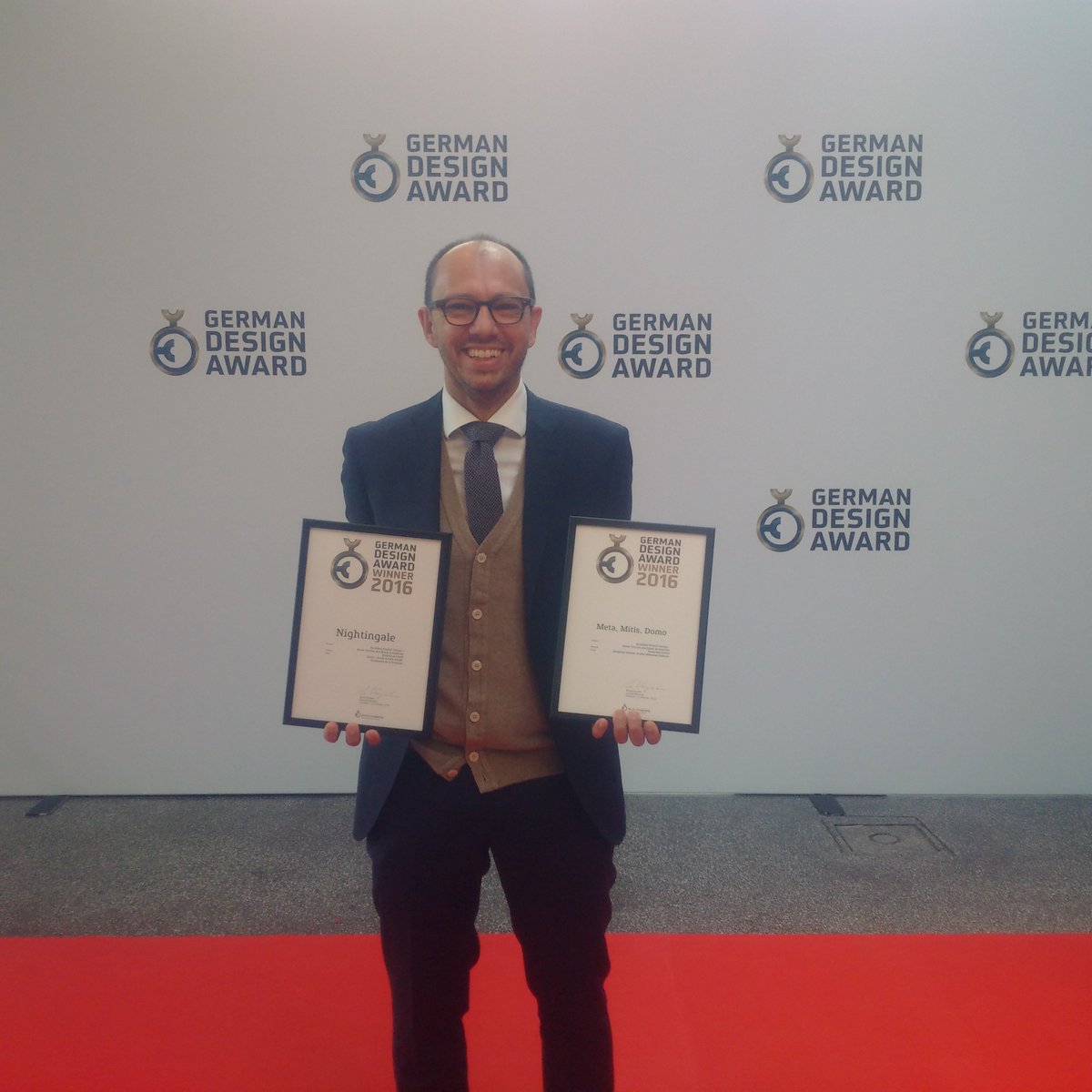 Rosenthal_info's tweet photo. #Rosenthal COO Gianluca Colonna with two #iFdesignawards for our colorful #Interiorcollection #meta #mitis #domo https://t.co/DllH9enCcY
