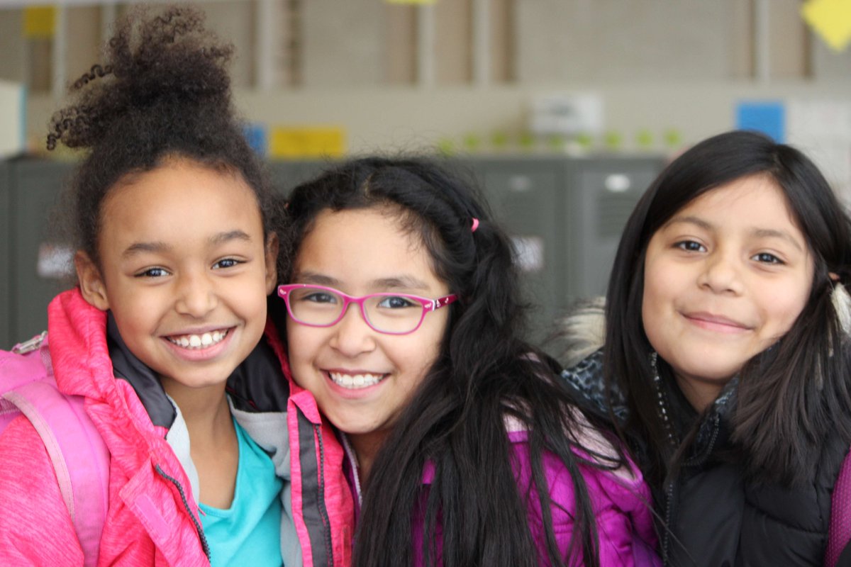 Love the big smiles after a great week at school! Or, is it the upcoming break  they're smiling about? You decide...