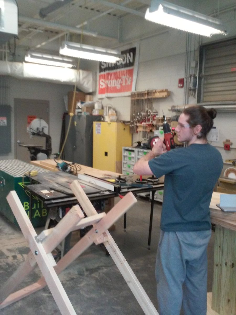 VTConcreteCanoe's tweet photo. The team's master carver creating the stands for our canoe! #WorkHard #IKnowWhatImDoing https://t.co/BlH8pSdSEw