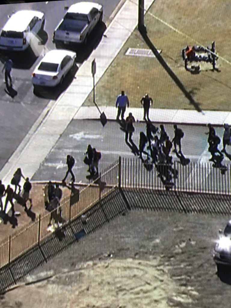 JRLiveNow's tweet photo. UPDATE: Skyfox overhead as students leave campus after 2 of their classmates were shot dead. #IndependenceHigh https://t.co/NkHmczx0BX