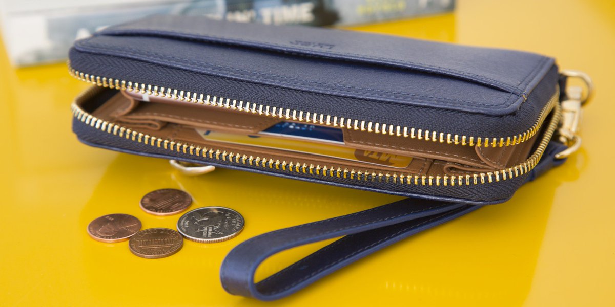 Bundled in bulky coats this winter? Leave your bag behind, and carry just the essentials in a smartphone wristlet!