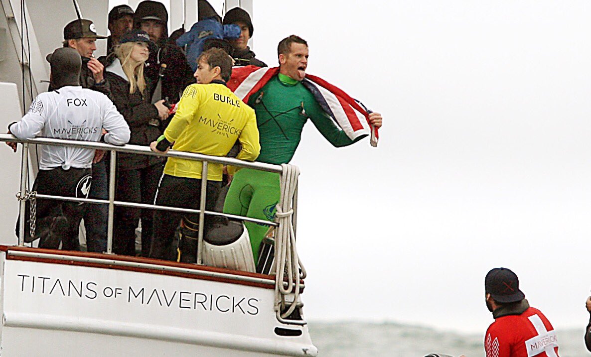 dancoyro's tweet photo. Santa Cruz surfer Nic Lamb drapes himself with the American flag after winning the Titans of Mavericks surf contest. https://t.co/MvJeLGYycN