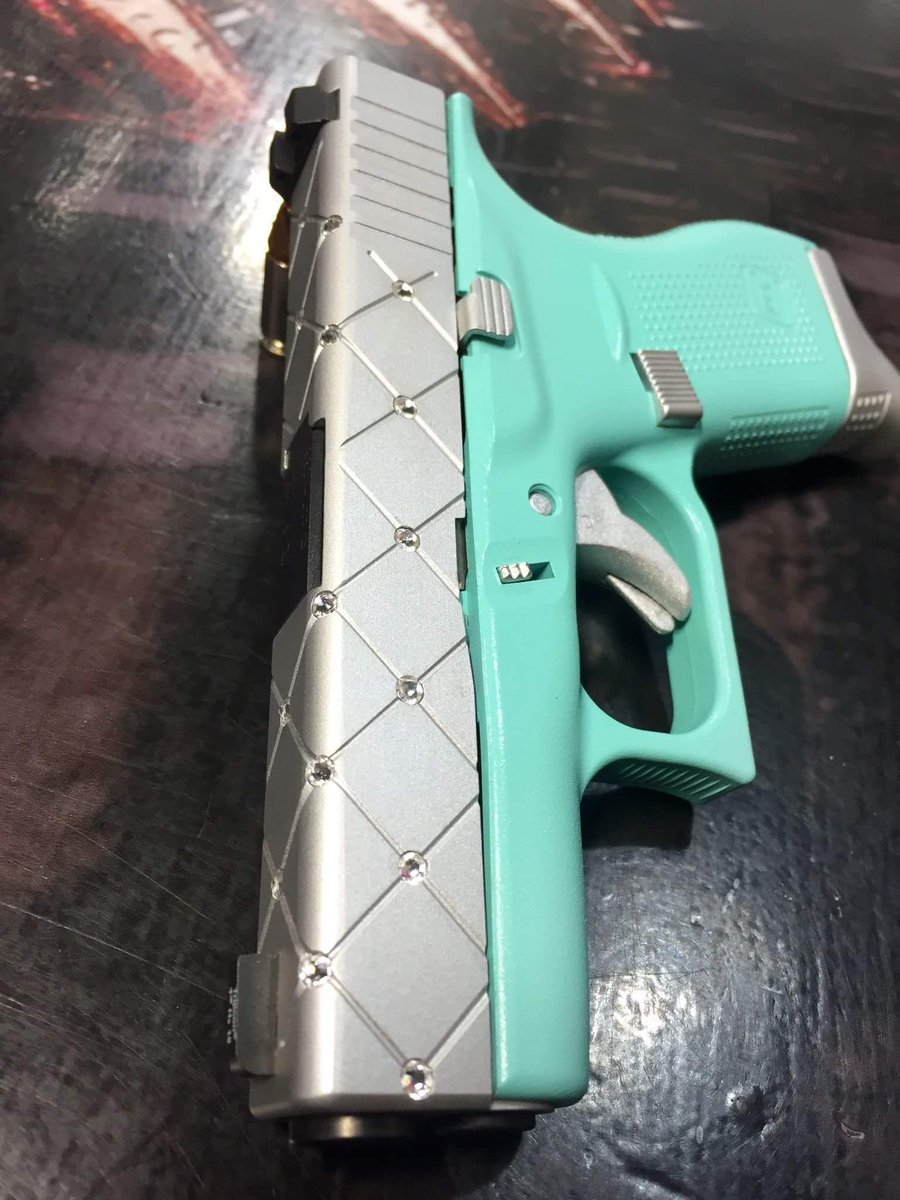 RayzorsEdgeTac's tweet photo. A custom Rhinestone Glock for the ladies? Take notes for Valentine's day. @GLOCKInc. @Trijicon #Guns #ForTheLadies https://t.co/mJiAoeJ5fU