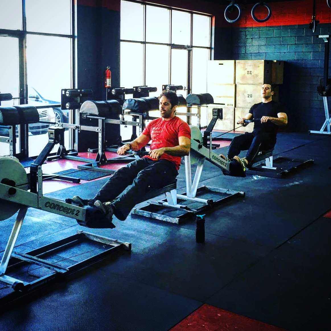 CrossFitHD's tweet photo. Grinding out a tandem #5krow #concept2 #crossfithd #hdbarbellclub #youlookbetterinHD #fitness https://t.co/ZiD4mdI6Pc