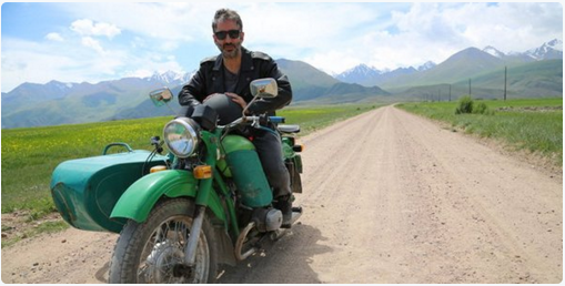 Baddiel's tweet photo. A promo pic for my new Silk Road @DiscoverUK show  (from next Sunday, 9pm). Not evidence of a mid-life crisis. https://t.co/XzLxnMRq7M