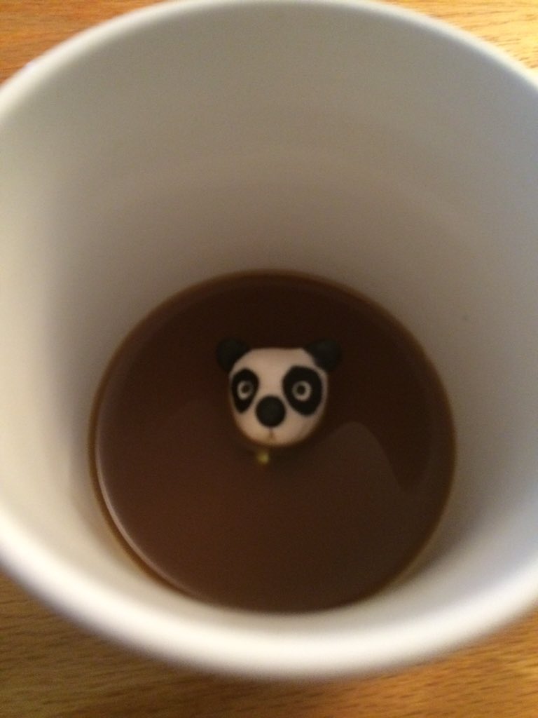 SannaWannaPanda's tweet photo. It's like he's taking a mud bath. #PandaSurprise https://t.co/zqXfZ17QB5