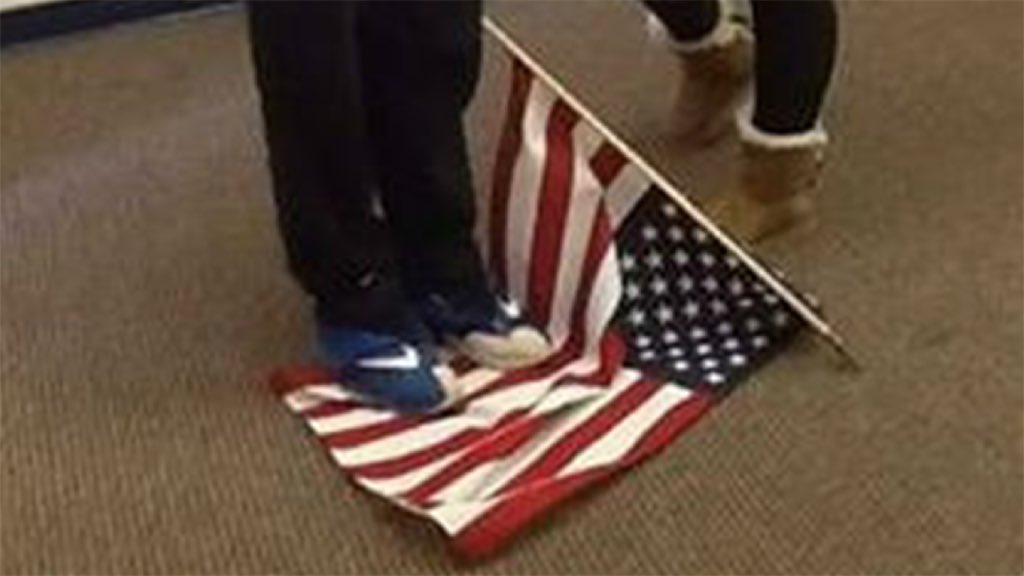 Richland School District Johnstown students stomp American flag