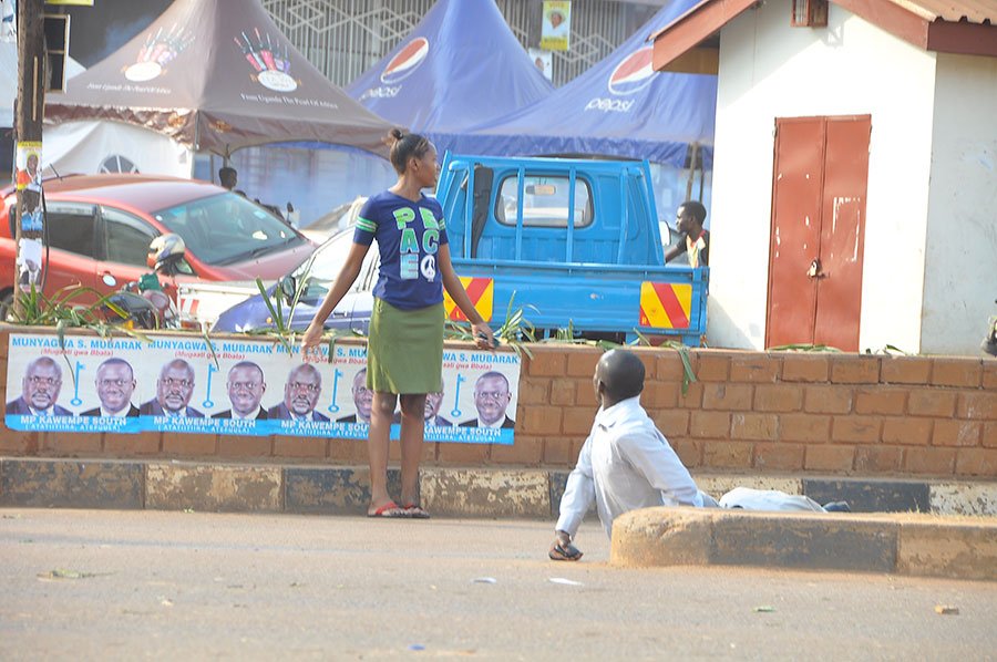 observerug's tweet photo. This woman in Wandegeya simply couldn't take cover like the rest even when police fired #UgandaDecides https://t.co/Pt1ySuKPPx