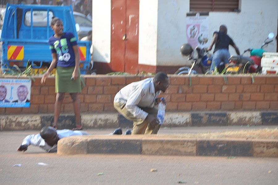 observerug's tweet photo. This woman in Wandegeya simply couldn't take cover like the rest even when police fired #UgandaDecides https://t.co/Pt1ySuKPPx