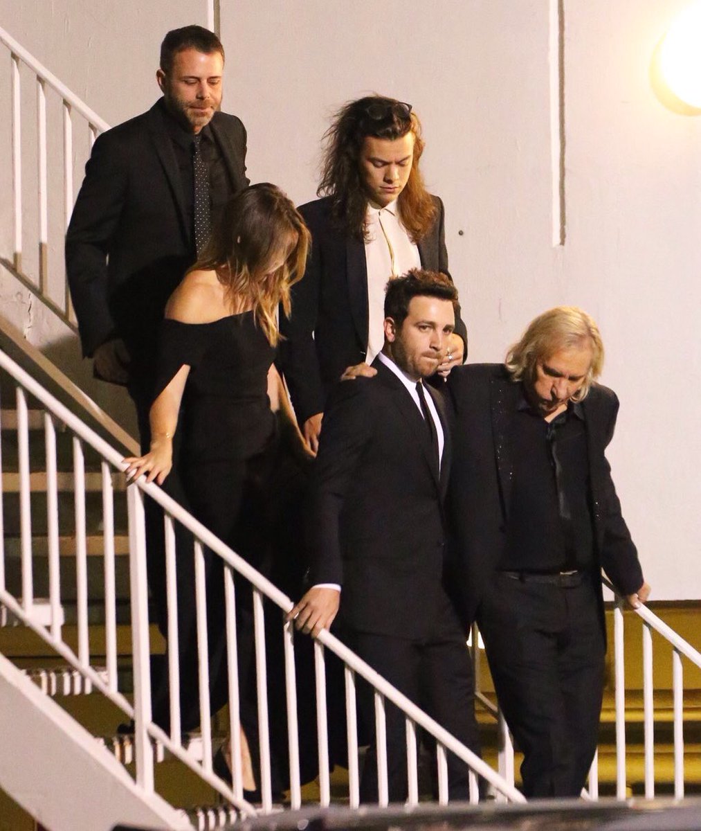 1DUpdateAccess's tweet image. Harry leaving a Grammy party last night with Glenne and Jeff. -H #GRAMMYs