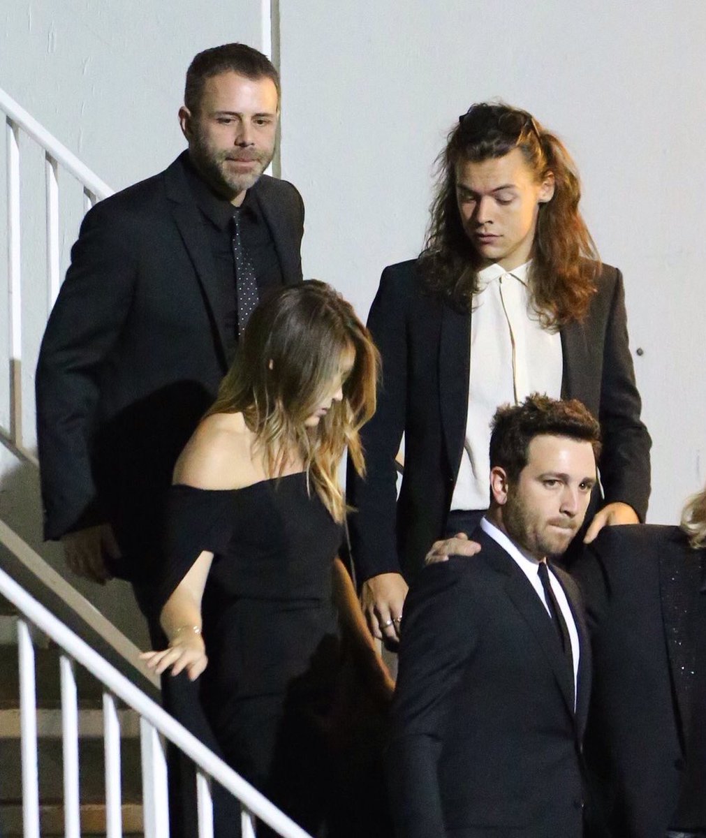 1DUpdateAccess's tweet image. Harry leaving a Grammy party last night with Glenne and Jeff. -H #GRAMMYs
