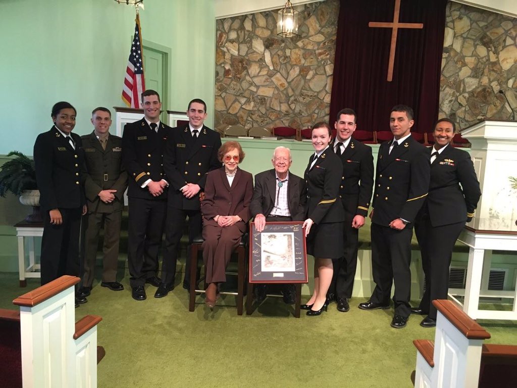 NavalAcademy's tweet photo. This #PresidentsDay weekend, #USNA midshipmen met former President Jimmy Carter while on an Admissions trip in GA. https://t.co/aceoXvIlcT