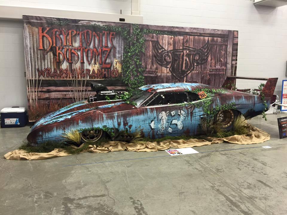 SirDivers's tweet photo. The @KKustomz wrap on the @CraigSullivanPM Richard Petty-themed @Dodge Daytona is #epic https://t.co/YHUnWLAs3H https://t.co/4HEZOkvuNW