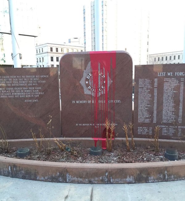 This is such a shitty thing to do. Vandalizing a memorial for fallen cops? That is disgusting.