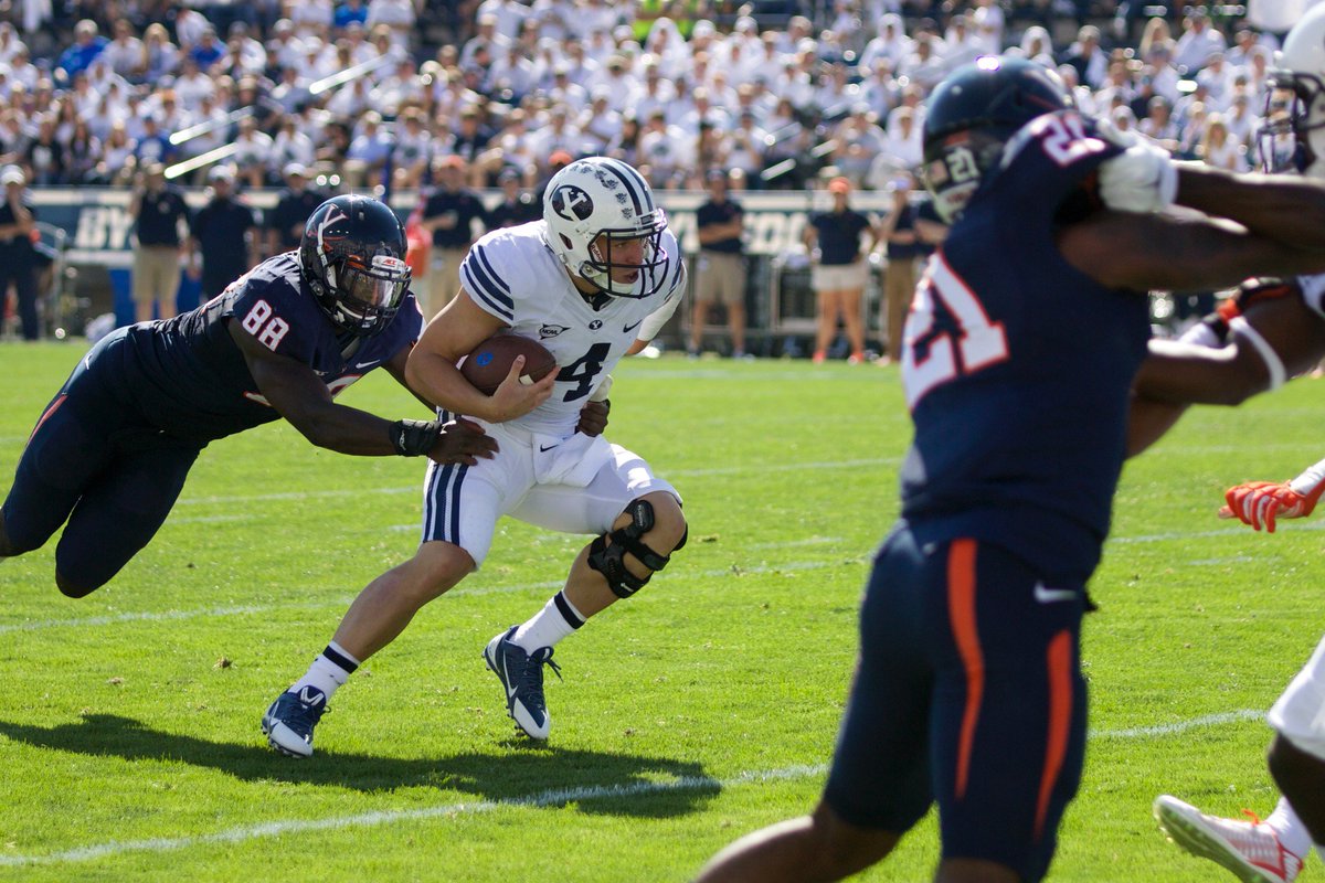 KSLdads's tweet photo. Virginia was in pursuit, and all the defender SAW is what Y fans wanted to HEAR:  Taysom’s back.  #moretothisphoto https://t.co/WNVQv9k8xa