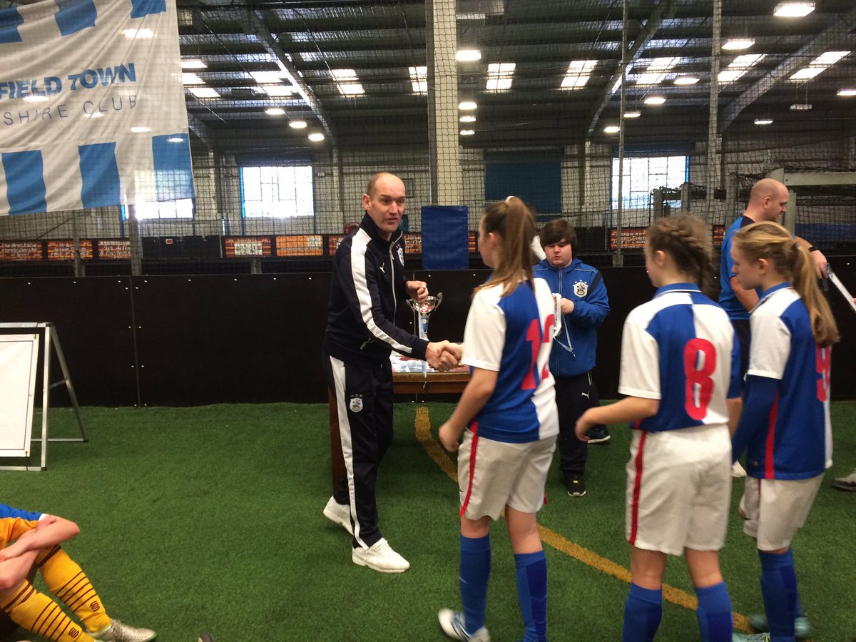 BRFCTrust's tweet photo. The girls from @greenbankhs collecting their medals from Andy Booth after coming 3rd in the @KinderSportUK #GirlsCup https://t.co/nPYNnAKecZ