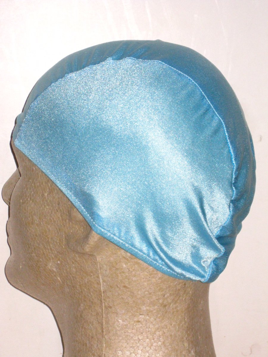 How about a Daddy &amp; Me cap, either matching solid colors or a suitable print for both OR Daddy, Mom &amp; Me.Better yet!