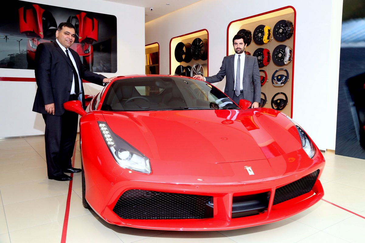 YogenPratap's tweet photo. #488GTB unveiled by A Sauvard, dir-sales, @Ferrari #MEA&amp;India &amp; Yadur Kapur, dir, #selectcars at its launch in Delhi https://t.co/eoq4M8Op7V