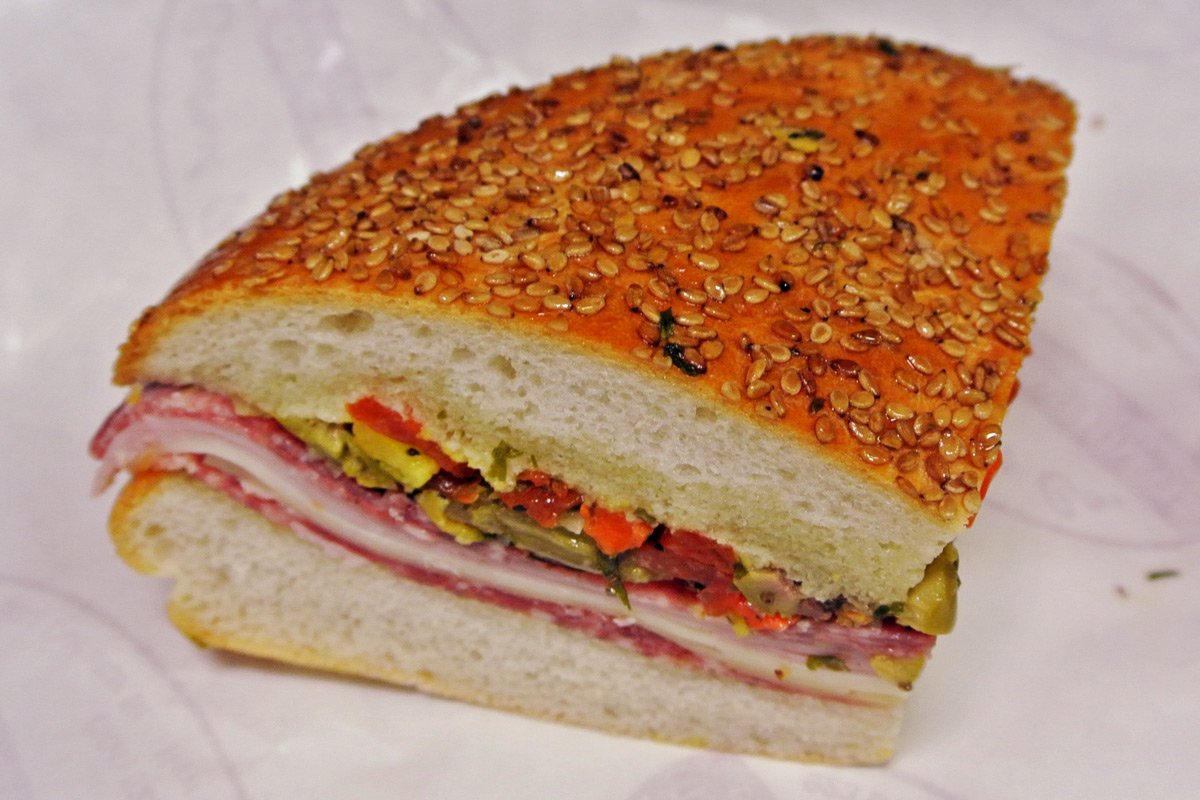 WinstonWanders's tweet photo. Experience New Orlean’s Quintessential Muffuletta Sandwich: https://t.co/AGVRWF37eN @CentralGrocery https://t.co/HbFdlMfmdL