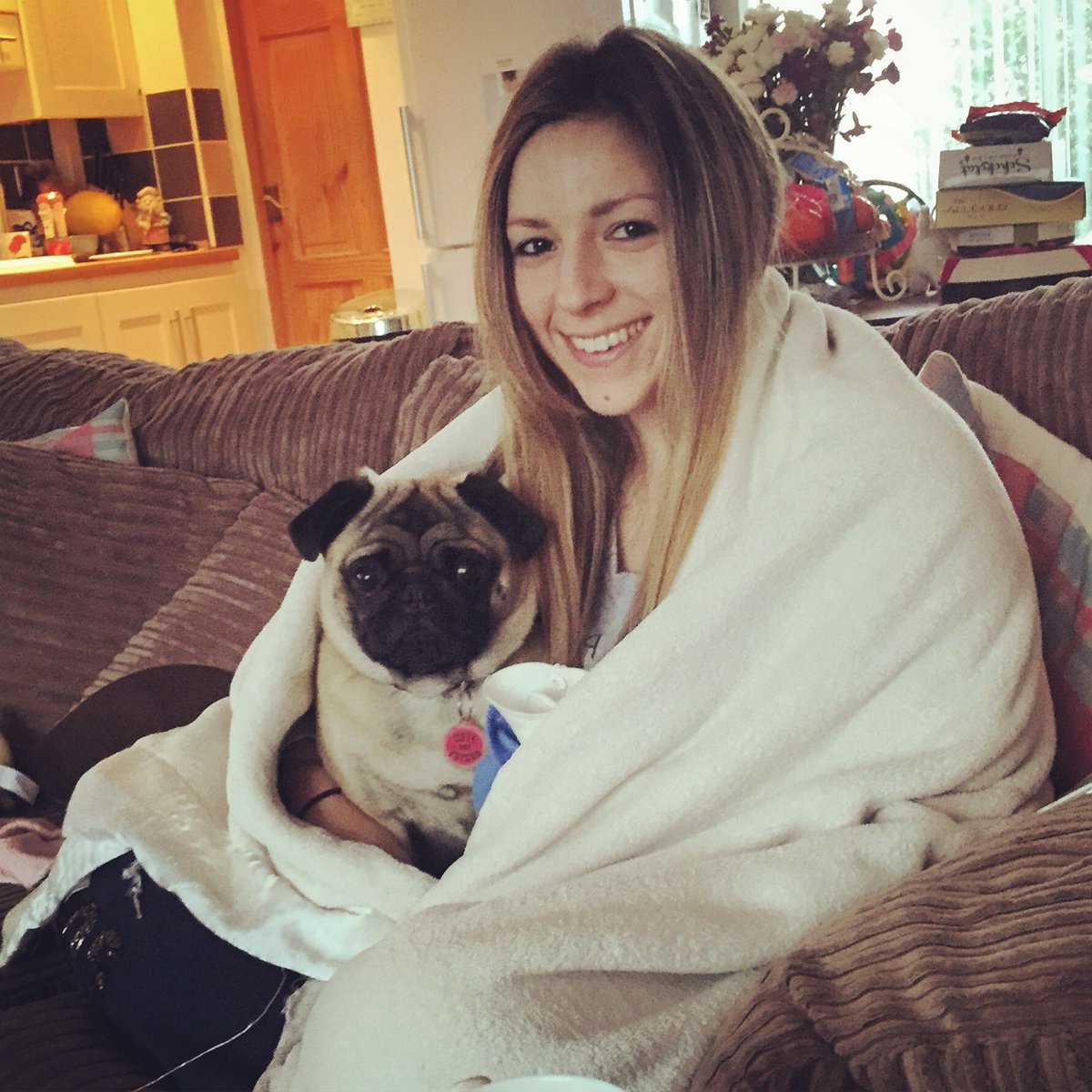 Sammylittle91's tweet photo. The best way to spend a day off when it's cold and raining is with blankets, hot water bottles and pug cuddles! https://t.co/2uRdGa1gkb